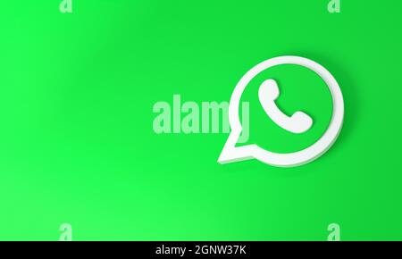 WhatsApp-Logo mit Platz für Text und Grafiken auf grünem Hintergrund. 3D-Rendering. Stockfoto