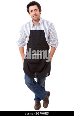 Porträt von hübscher junger Mann mit Schürze vor weißem Hintergrund Stockfoto