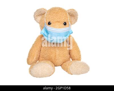 Teddybär in einer medizinischen Maske. Stockfoto