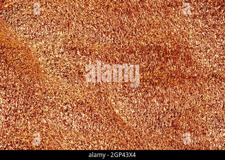 goldene zerknitterte Folienstruktur, Nahaufnahme Stockfoto