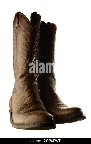 Ein isoliertes Paar Cowboystiefel aus Leder in Weiß. Stockfoto