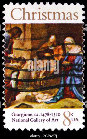 MOSKAU, RUSSLAND - 4. AUGUST 2021: Die in den USA gedruckte Briefmarke zeigt die Anbetung der Hirten von Giorgione, Weihnachtsserie, um 1971 Stockfoto