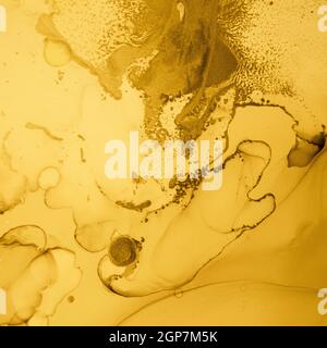 Gold Fluid Art. Abstrakte Marmortapete. Stockfoto