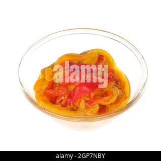 Geröstete Paprika mit Öl in Schüssel aus Glas Stockfoto