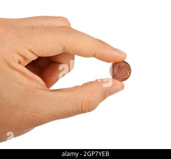 1 Euro-Cent zwischen den Fingern auf weißem Hintergrund Stockfoto