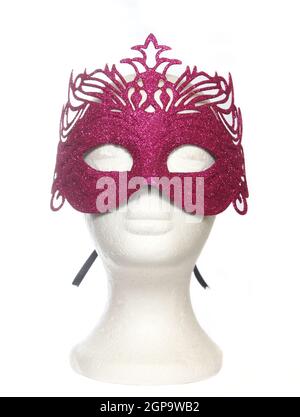 Rosa Karneval Mardi Gras Maske auf Mannequin Kopf Stockfoto