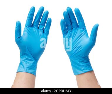 Zwei Hände eines Mannes, der Nitrilhandschuhe auf weißem Hintergrund trägt Stockfoto