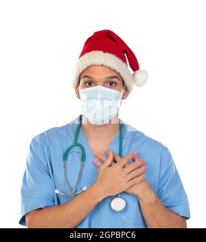 Afrikanischer Arzt trägt einen Weihnachtshut bei Coronavirus Zeit isoliert Auf weißem Hintergrund Stockfoto