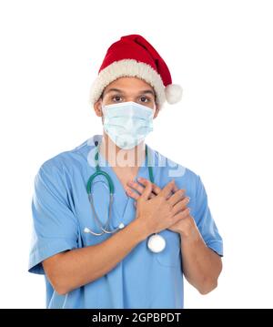 Afrikanischer Arzt trägt einen Weihnachtshut bei Coronavirus Zeit isoliert Auf weißem Hintergrund Stockfoto