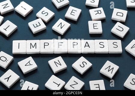 Impfkarte 'Impfpass oder Impfausweis' steht für einen Impfpass. Wort und Buchstaben auf blauem Hintergrund. Deutschland Stockfoto