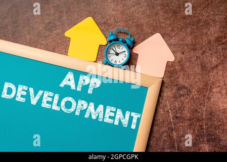 Textunterschrift zur App-Entwicklung. Wort geschrieben auf Development Services für tolle mobile und Web-Erfahrungen Zeitmanagment Pläne für Stockfoto