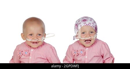 Entzückende Baby mit einem Kopftuch gegen die Krankheit Stockfoto