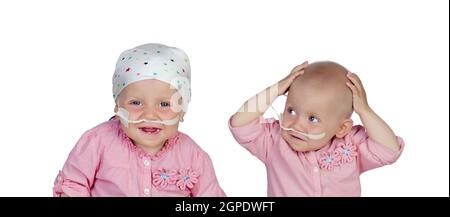 Entzückende Baby mit einem Kopftuch gegen die Krankheit Stockfoto