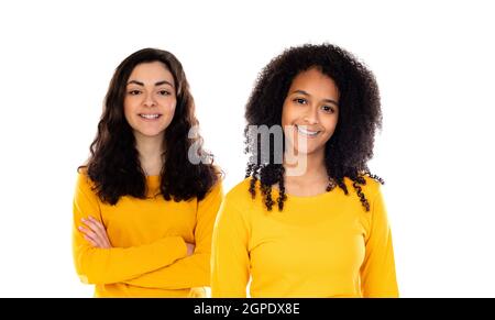 Zwei schöne junge Gürtel mit bunten Pullover isoliert auf einem Weißer Hintergrund Stockfoto