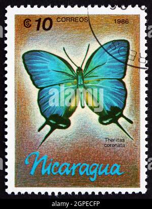 NICARAGUA - UM 1986: Eine in Nicaragua gedruckte Briefmarke zeigt Theritas Coronata, Schmetterling, um 1986 Stockfoto