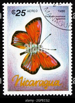 NICARAGUA - UM 1986: Eine in Nicaragua gedruckte Briefmarke zeigt Paleochrysophonus Hippothoe, Butterfly, um 1986 Stockfoto