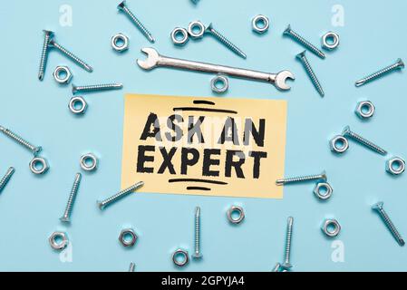 Textunterschrift mit „Fragen Sie einen Experten“. Konzept bedeutet Bestätigung, die gelesen haben, die Richtlinien zu verstehen und zu akzeptieren, Wartungswerkzeuge und Stockfoto