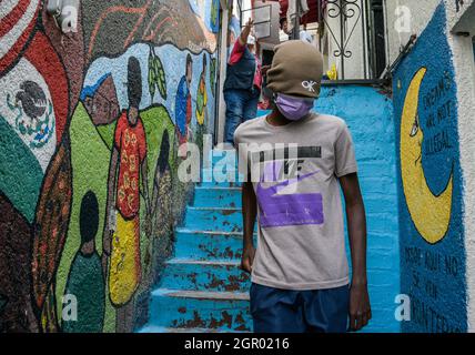 Non Exclusive: Haitianische Migranten ruhen während ihres Aufenthalts im Hostel Tochan, einer Stiftung, die Migranten auf ihrer Reise durch Mexiko zu den Vereinten Nationen unterstützt Stockfoto