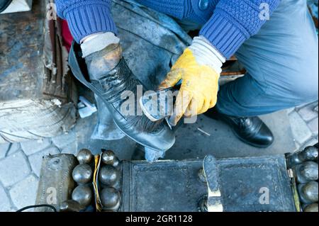 Schuhputzservice, Schuhputzservice in der Stadt Stockfoto