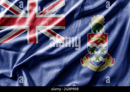 Winkende detaillierte Nationalflagge der Cayman-Inseln Stockfoto