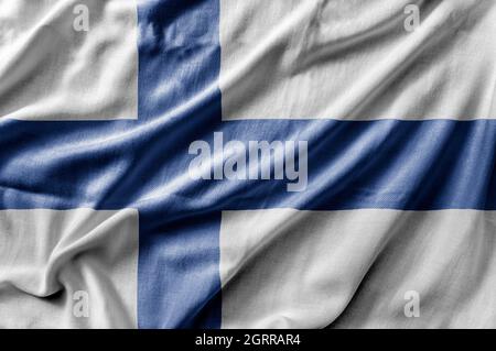 Winkende detaillierte Nationalflagge Finnlands Stockfoto