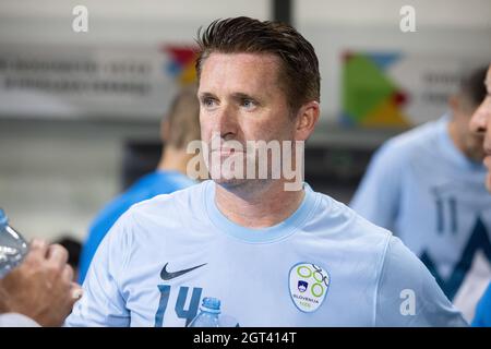 Der ehemalige Kapitän der Nationalmannschaft der Republik Irland, Robbi Keane, wird während eines Wohltätigkeitsfußballspiels in Ljubljana vor Gericht gesehen. Ehemalige und jüngere slowenische Spitzensportler, Mitglieder des slowenischen Olympischen Teams und ehemalige slowenische und internationale Fußballstars nahmen an einem traditionellen Wohltätigkeitsfußballspiel in Ljubljana Teil, um Gelder für Sponsoring in Sport zu sammeln, eine Initiative, die jungen Sportlern aus benachteiligten Verhältnissen hilft. Das Spiel wird von Aleksander Ceferin, Präsident der Union der Europäischen Fußballverbände, gesponsert, der ebenfalls an dem Spiel teilgenommen hat und b organisiert wurde Stockfoto