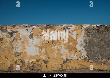 Alte Wandstruktur, Vintage Hintergrund mit verblassendem Gips Stockfoto