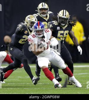 New Orleans, Usa. Oktober 2021. Die New Yorker Giants laufen zurück Saquon Barkley (26) spielt am Sonntag, den 3. Oktober 2021, im Caesars Superdome in New Orleans gegen die Verteidigung der Heiligen von New Orleans. Foto von AJ Sisco/UPI. Kredit: UPI/Alamy Live Nachrichten Stockfoto