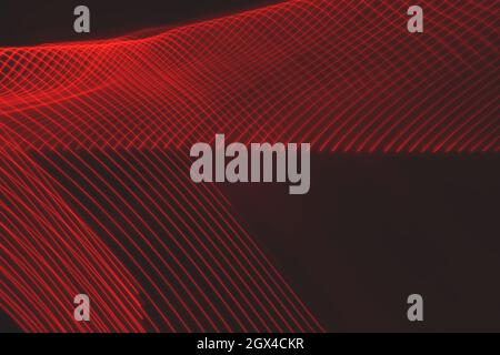 Abstraktes Leuchtmuster in Neonrot Stockfoto