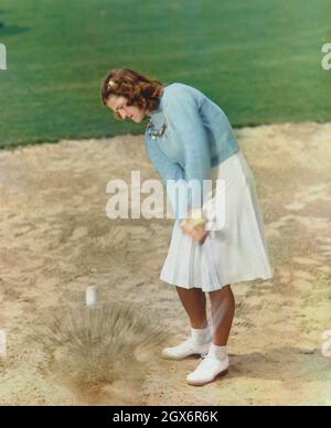 Mildred 'Babe' Didrikson Zaharias (1911-1956), amerikanischer Athlet, Action-Portrait Playing Golf, Harry Warnecke, Robert F. Cranston, Gus Schoenbaechler, 1947 Stockfoto