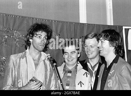 Die irische Rockband The Boomtown Rats, die im November 1979 bei einer Siegerehrung der Melody Maker-Umfrage einen Preis entgegennahm. Sänger Bob Geldof, KBE, ist auf der linken Seite. Stockfoto