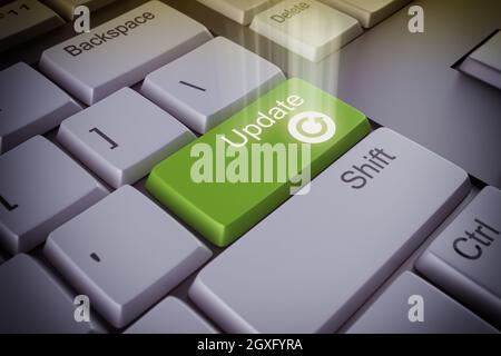 Computertastatur mit einer grünen Aktualisierungstaste Stockfoto