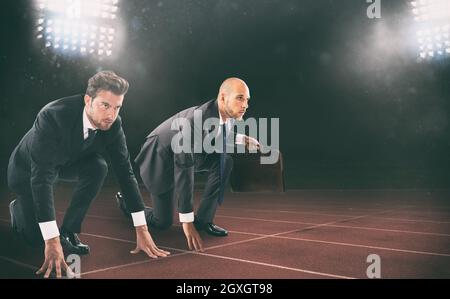 Zwei Geschäftsleute bereit, einander bei der Arbeit Herausforderung Stockfoto