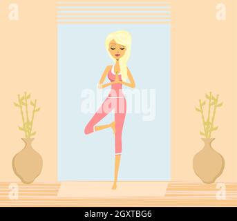 Schöne Frau im traditionellen Yoga pose Stockfoto
