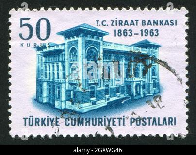 TÜRKEI - UM 1963: Briefmarke gedruckt von der Türkei, zeigt Landwirtschaftliche Bank, um 1963. Stockfoto