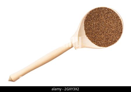 Draufsicht auf Vollkorn-Teff-Samen in Holzlöffel isoliert Auf weißem Hintergrund Stockfoto