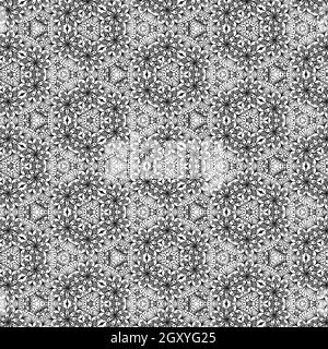 Schöne und elegante monochromatische und graue symmetrische Mandala Designs auf massiven Blatt Tapete. Stockfoto