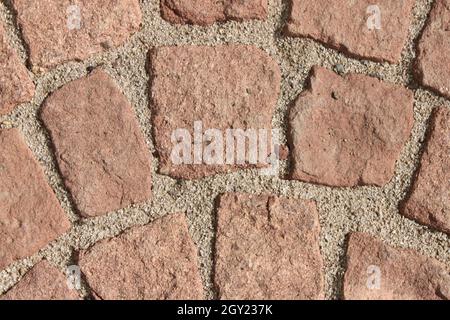 Bürgersteig mit rotem Kopfsteinpflaster Stockfoto