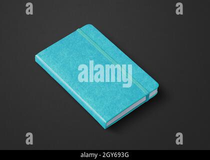 Aqua Blau geschlossen Notebook mockup isoliert auf Schwarz Stockfoto