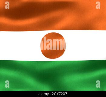 Niger Flagge - realistische wehende Stoffflagge Stockfoto