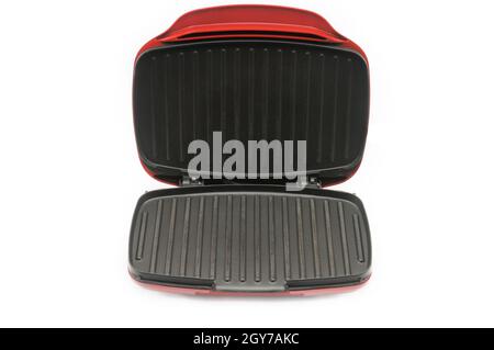 Home verwenden Sie elektrischen Grill auf isoliertem weißem Hintergrund Stockfoto