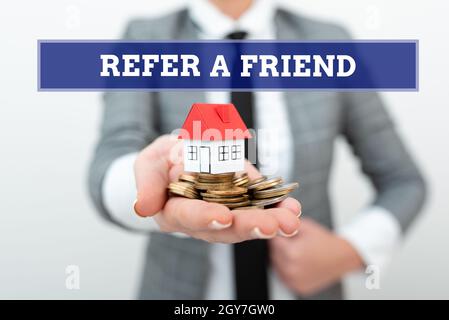 Handschriftentext Refer A Friend, Word for direct someone to another or send him something like Gift Real Estate Agent Selling New Property, Architect Stockfoto