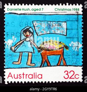 AUSTRALIEN - UM 1988: Eine in Australien gedruckte Marke zeigt die Krippe von Danielle Hush, Kinderdesign, Weihnachten, um 1988 Stockfoto