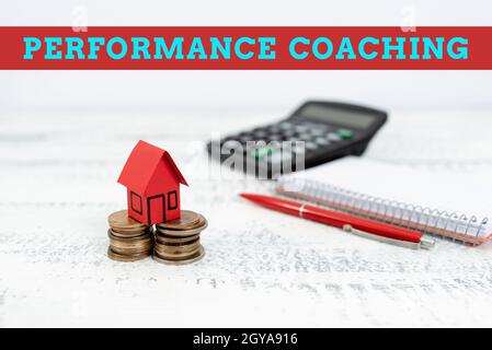 Schreiben mit Text Performance Coaching, Wort für die Entwicklung und Aktionsplanung eines anderen Selling Land Ownership, Investing on New propert Stockfoto