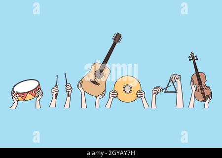 Musikinstrumente und kreatives Kunstkonzept. Menschliche Hände halten Musikinstrumente Gitarre Geigentrommeln teangle über blauen Hintergrund Vektor illustrr Stockfoto