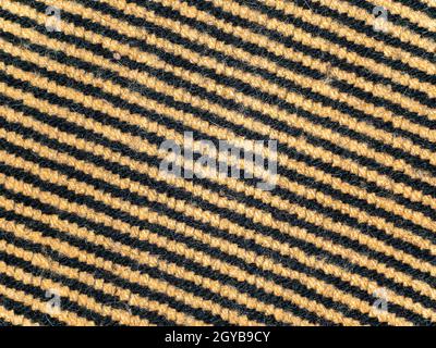 Struktur aus farbigem gestreiften Wollstoff. Platz für Text. Hintergrundbild. Stockfoto