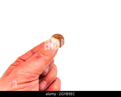 Geld kleine Münzen in einer Hand auf weißem Hintergrund. Euro. Cent. Geschäft. Platz für Text. Platz frei. Hintergrundbild. Stockfoto