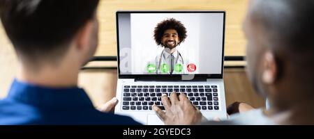 Arzt Video-Telefonkonferenz Am Computer Stockfoto