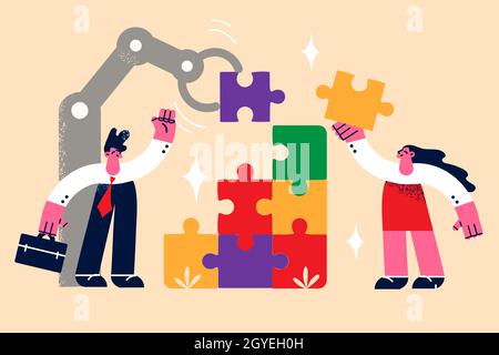 Teamwork, Business-Zusammenarbeit-Konzept. Zwei junge Leute, Geschäftskollegen, Mann und Frau, vereinen Anstrengungen, um Teile eines Puzzles zu reparieren Stockfoto