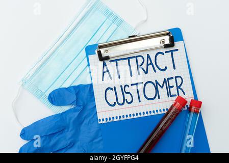 Text mit Inspiration Attract Customer, Word für mehr Kunden oder Kunden zu Ihrem Geschäft oder Ihrer Website Vorbereitung und Verschreibung Med zu bringen Stockfoto